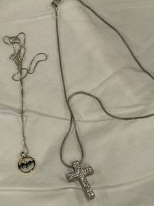 lot 4 image: Set of 2 Necklaces with Cross and Mountain Pendants