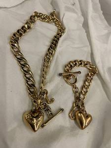 lot 18 image: Juicy Couture Gold-Toned Charm Necklace and Bracelet Set