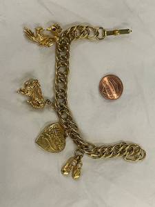 lot 33 image: Vintage 14k Gold Charm Bracelet with Animal Charms