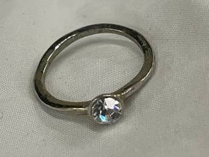 lot 69 image: Elegant Silver-Toned Ring with Clear Crystal Accent