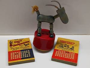 lot 40 image: Vintage Wood Kohner Donkey Pop Up Toy and Vintage Punch Party Games