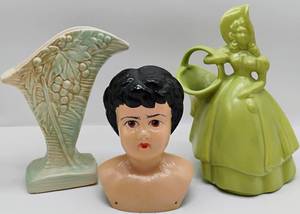 lot 108 image: Antique Metal Tin China Doll Head McCoy Vase and Haegar Girl with Basket Pottery Vase