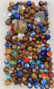 lot 93 image: Vintage Marbles and Clay Shooters