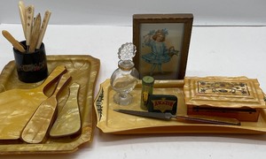 lot 191 image: Vintage Art Deco BakeliteCelluloid Vanity Sets Manicure Set and Advertising Tins
