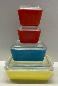 lot 144 image: Vintage Four Piece Pyrex Primary Colors Refrigerator Set