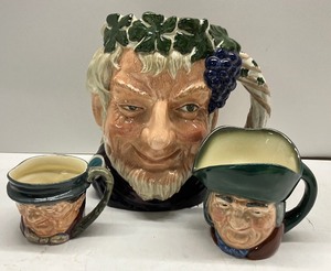 lot 29 image: Large Royal Doulton Bacchus Mug and Two Small Toby Mugs