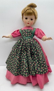 lot 114 image: Madame Alexander Vintage Little Women Meg Doll with Original Tag and Clothing Louisa Mae Alcott Doll