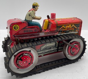 lot 150 image: Vintage Marx Toys Tin Lithograph Tractor Diesel 12 Wind Up Climbing Tractor