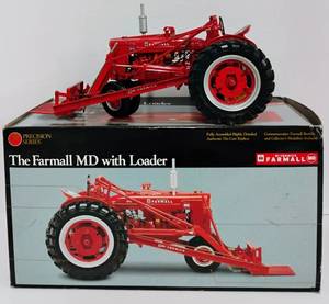 lot 206 image: The Farmall MD with Loader Authentic Die Cast Replica with Box