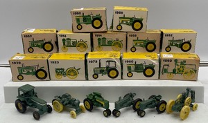 lot 52 image: Lot of 18 Miniature John Deere Metal Tractors with Boxes