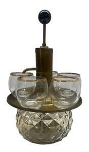 lot 154 image: Mid-Century Park Sherman Glass and Brass Liquor Pump Decanter with five gold-rimmed glasses Vintage