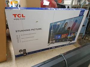 lot 801 image: TCL 65 TV  4K UHD (in original packaging)