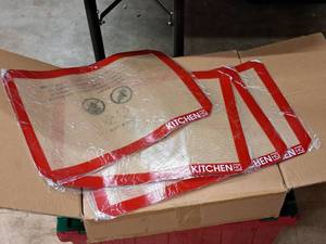 lot 868 image: Lot of (4) Kitchen HQ Silicone Baking Mats 11-12x16-12 (Red Edge) (in original packaging)