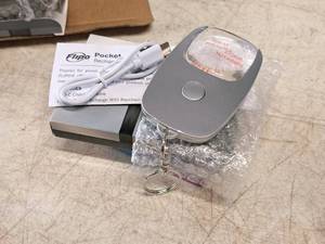 lot 942 image: Lot of (2) Flipo Pocket Zoom Rechargeable LED Mini Keychain Magnifier (in original packaging)