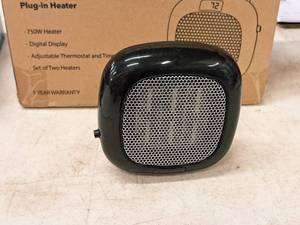 lot 949 image: Lot of (2) Hunter Plug-In Heaters (in original packaging)