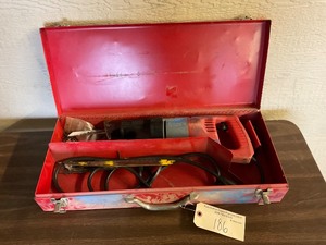 lot 186 image: Milwaukee Sawzall with Metal carrying case