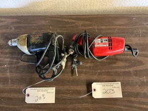 lot 203 image:  Electric Drills  Milwaukee & Black & Decker