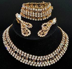 lot 130 image: Weiss Gold Toned Rhinestone Necklace, Bracelet and Clip On Earrings