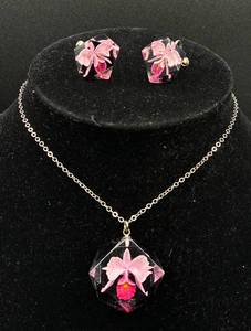 lot 131 image: Vintage Clear Lucite Captured Orchid Twist On Earrings and Necklace