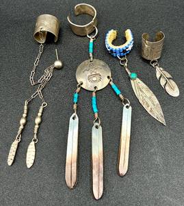 lot 120 image: Collection of Four .925 Sterling Silver Ear Cuffs with Feathers