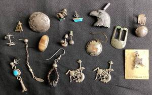 lot 124 image: Assorted Collection of .925 Sterling Silver Jewelry Pieces