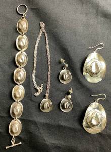 lot 122 image: Collection of .925 Sterling Silver Cowboy Hat Jewelry