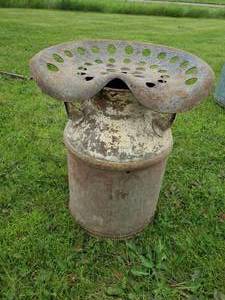 lot 41 image: Vintage Milk can With Vintage Tractor seat