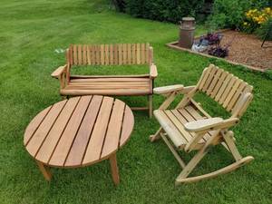 lot 61 image: Indoor outdoor Wooden Rocking Chair, Bench and Coffee Table in solid condition