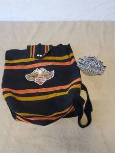 lot 146 image: Cloth Harley Davidson Backpack In Great Condition, and Harley Davidson Emblem