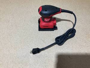 lot 37 image: Milwaukee 6033-21 14-Sheet Palm Sander
