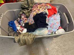lot 227 image: Bin of shirts, socks, belts, pants
