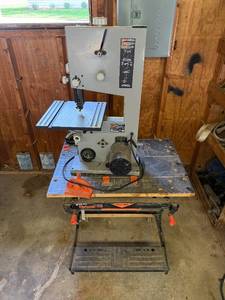 lot 5 image: Ryobi 9-Inch Band Saw with Workmate 550 Stand