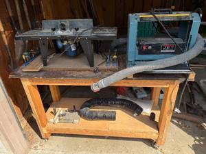 lot 14 image: JET 12-Inch Planer and Router Table Setup with Accessories