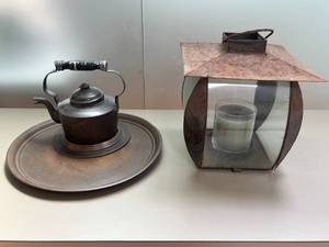 lot 43 image: Gustav Stickley Hammered Copper Tea Kettle with Tray and Metal Candle Lantern