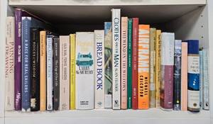 lot 52 image: Collection of 22 Assorted Books Including Fiction, Non-Fiction, and Guides