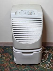 lot 112 image: Used Whirlpool Dehumidifier with Adjustable Dryness Control
