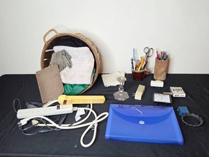 lot 122 image: Assorted Household Items including Power Strips, Stationery, and Storage Basket