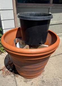 lot 152 image: Large Terracotta and Plastic Planter Set