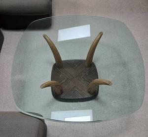 lot 182 image: Glass Top Coffee Table with Artistic Wooden Base