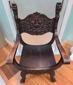 lot 203 image: Antique Hand-Carved Wooden Armchair with Face Motif