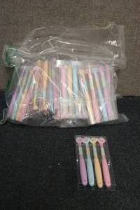 lot 3 image: 12-4 packs of pet toothbrushes...