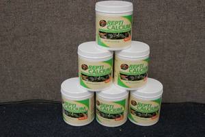 lot 57 image: 6-8oz containers of REPTI CALCIUM W...