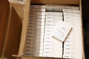 lot 80 image: case of poker size playing cards...