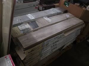 lot 233 image: Large pallet of Traffic Master and other flooring