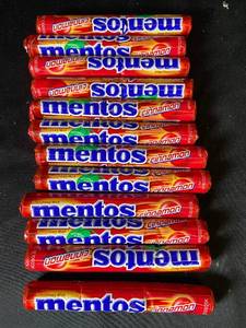 lot 20 image: G4 - Lot of 12 Mentos Cinnamon Chewy Mints