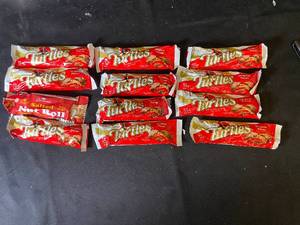 lot 60 image: T4 - Collection of 11 Turtles Chocolate and Salted Nut Roll Bars