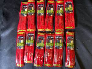 lot 71 image: Collection of 12 Jack Links Jalapeo Beef Stick & Cheese Snacks