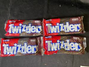 lot 142 image: I 4 - 4 Packs of Twizzlers Hersheys Chocolate Flavored Candy