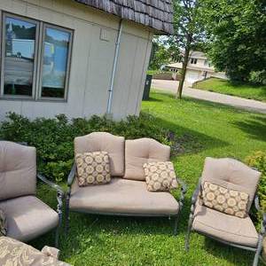 lot 34 image: 3 piece Wrought Iron Style  Patio Set with Cusions. Love Seat, 2 Chairs(one arm needs..