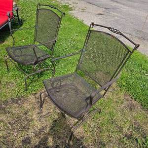 lot 37 image: Pair of  Iron Spring Back Pation Chairs